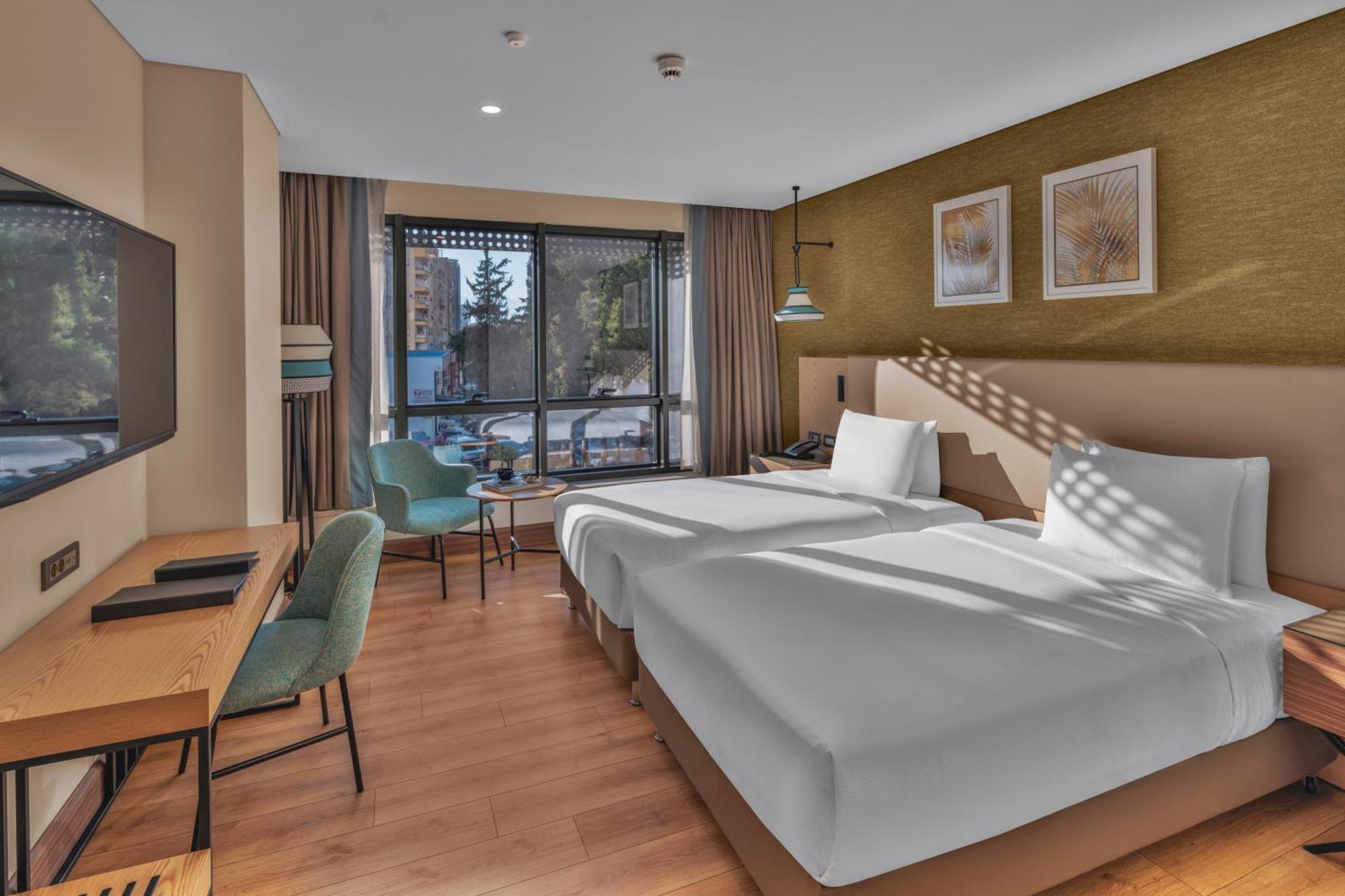 Doubletree By Hilton Antalya City Centre Kültér fotó A room at the hotel